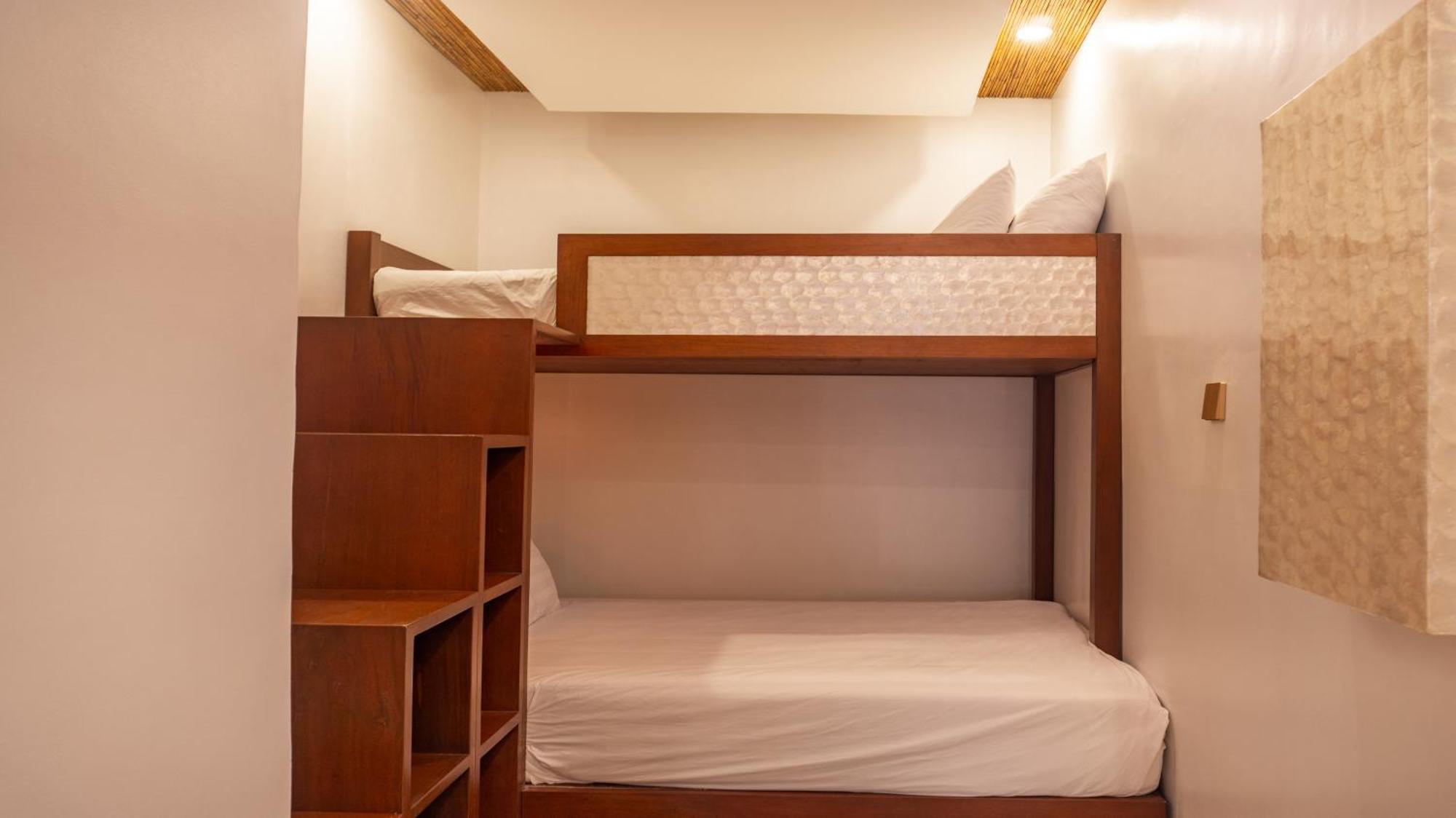 Ambassador In Paradise Balabag  Exterior foto A bunk bed